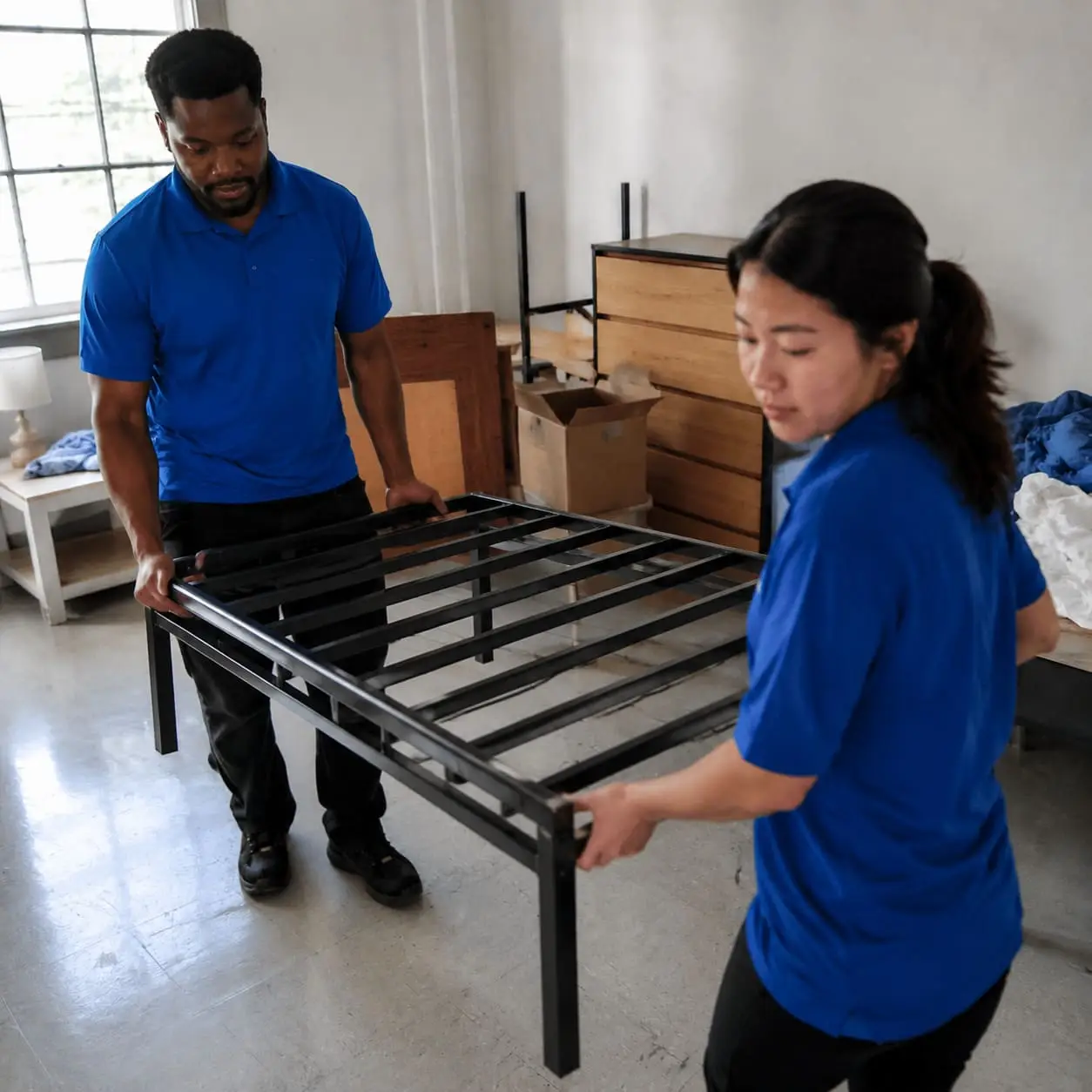 GT Removals staff helping a student move - Illustrative Image